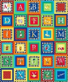 a colorful quilt with letters and numbers on it