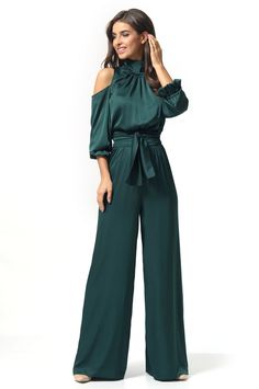 An evening jumpsuit with open shoulders and neck ties. Wide pants with a wide and long belt. The high waistline has an elastic band for added comfort and size adjustment. The inseam length is 88 cm. Made of Armani silk, 100% polyester. Summer Evening Jumpsuits With Tie Waist, Summer Evening Jumpsuits And Rompers With Tie Waist, Elegant Belted Jumpsuits For Night Out, Elegant Evening Strapless Maxi Jumpsuit, Elegant Belted Jumpsuits And Rompers For Party, Elegant Belted Jumpsuit For Party, Elegant Belted Pantsuit For Evening, Chic Green Evening Jumpsuits And Rompers, Chic Strapless Maxi Jumpsuit For Parties