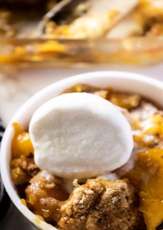 a close up of a bowl of food with ice cream