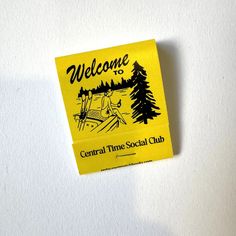 a yellow sticker that says, welcome to central time - social club on it