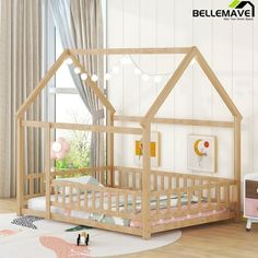 a child's bedroom with a wooden doll house bed and toys on the floor