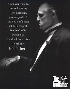 a man in a suit and tie with a quote from the godfather on it