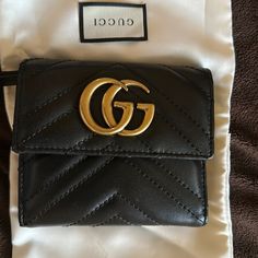 Gucci Marmont Leather Wallet Good Condition Designer Black Wallet With Gold-tone Hardware, Designer Black Wallets With Gold-tone Hardware, Black Gucci Wallet For Evening, Designer Gucci Wallets With Gold-tone Hardware, Designer Gucci Bags With Card Slots, Chic Gucci Wallet For Everyday Use, Classic Gucci Wallet With Gold-tone Hardware, Classic Gucci Wallets With Gold-tone Hardware, Elegant Gucci Wallet With Gold-tone Hardware