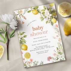 a baby shower is shown with lemons and flowers