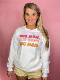 This limited edition Retro Dog Mom Sweatshirt is an ideal choice for the fashionable pet parent! Cozy, comfortable, and one of a kind - designed here at the sassy owl. Unisex and loose fitting Carrington has on a small. Fun Cotton Sweatshirt For Loungewear, Spring Cotton Sweatshirt With Custom Print, Cotton Fun Style Relaxed Fit Sweatshirt, Fun Cotton Sweatshirt With Graphic Print, Fun Relaxed Fit Cotton Sweatshirt, Playful Cotton Sweatshirt With Letter Print, Cotton Sweatshirt With Funny Print For Loungewear, Funny Print Cotton Sweatshirt For Loungewear, Cotton Loungewear Sweatshirt With Funny Print