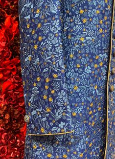 A regal blue sherwani adorned with intricate floral embroidery in gold and silver tones. The high-collared design and detailed buttons exude sophistication, making it perfect for weddings and grand celebrations. The luxurious fabric and rich embroidery make this sherwani a statement piece for any groom or special occasion. Key Features: Color: Royal blue with gold and silver floral embroidery. Design: High-collared with ornate buttons. Fabric: Rich, textured fabric for a luxurious feel. Occasion Blue Bandhgala With Chikankari Embroidery For Festive Occasions, Blue Bandhgala With Zari Work For Festivals, Blue Straight Kurta Bandhgala For Festive Occasions, Formal Blue Sherwani With Resham Embroidery, Royal Style Long Sleeve Kurta For Eid, Royal Long Sleeve Kurta For Eid, Elegant Blue Sherwani For Eid, Festive Blue Bandhgala, Formal Blue Kurta With Dabka Work