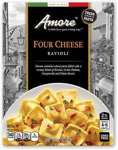 an advertisement for four cheese ravioli on a plate in front of a cityscape