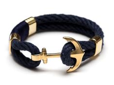 Our anchor bracelet is essential for any nautical lover! -Navy blue rope -Gold plated anchor clasp -Gold plated spacer bead -Wrapped thread detail ****************************************************************** Sizing: If youre looking for a snug fit, we recommend ordering 1/2 Casual Navy Bracelet As A Gift, Casual Navy Bracelets For Gifts, Adjustable Blue Nautical Bracelets, Adjustable Blue Nautical Bracelet, Nautical Anchor Bracelets As Gift, Nautical Anchor Bracelet As Gift, Nautical Anchor Bracelet Gift, Navy Nautical Adjustable Bracelets, Adjustable Navy Nautical Bracelet