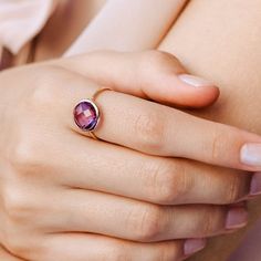 Amethyst ring in 14K solid gold. A gold stacking ring with a natural amethyst gemstone. A perfect gold ring for women who love colors and elegant jewelry. And, note; purple amethyst is the birthstone of February. The best gift for her.100% handcrafted with love!D E T A I L S● Metal: 14K solid gold, 14K white gold or 14K rose gold● Gemstone: Purple Amethyst, briolette cut● Stone Diameter: 10mm (0.5in)R I N G ∙ S I Z I N GFor General Reference:● we use standard US Ring Sizing● an average women's r Faceted Amethyst Ring In Yellow Gold Fine Jewelry, Purple Gemstones In 14k Gold, Round Shaped, Purple Round Gemstones In 14k Gold, Round Amethyst Birthstone Ring In Fine Jewelry Style, Fine Jewelry 14k Gold Amethyst Ring, 14k Gold Round Amethyst Ring, Fine Jewelry, Fine Jewelry 14k Gold Round Amethyst Ring, Rose Gold Amethyst Ring Gift With Birthstone, 14k Gold Round Amethyst Ring