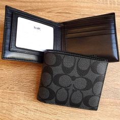 Nwt Coach Men Compact Id Wallet In Signature Canvas Black/Charcoal. Signature Coated Canvas Eight Credit Card Slots Full-Length Bill Compartments Removable Insert With Id Window And Two Credit Card Slots 4 1/4" (L) X 3 3/4" (H) X 3/4" (W) Style No. F74993 Wallet For Men Boyfriends Gift Ideas, Mens Coach Wallet, Designer Wallets Men, Coach Black Wallets With Card Slots, Black Coach Wallets With Card Slots, Luxury Black Coach Wallet, Gray Leather Wallet For Everyday Use, Coach Black Leather Wallet, Gray Leather Wallet