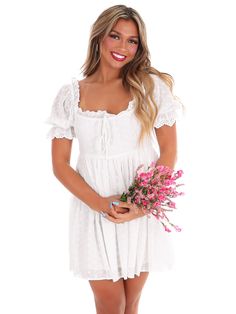 Embark on a new fashion journey with our New Adventure Mini Dress! This off white dress boasts embroidered eyelet detail, shirring front tie, and a back zip closure for easy dressing. Its lined construction and short sleeves with elastic and ruffled cuffs add a touch of comfort to its stylish design. Let this dress take you on a playful and unique style adventure! Summer Eyelet Dress With Short Sleeves, White Short Sleeve Mini Dress With Eyelet Details, White Eyelet Short Sleeve Mini Dress, White Eyelet Mini Dress With Short Sleeves, Short Sleeve Lace Mini Dress With Broderie Anglaise, Broderie Anglaise Mini Dress With Short Sleeves For Brunch, Eyelet Short Sleeve Dresses For Brunch, Short Sleeve Eyelet Dress For Brunch, Casual Short Sleeve Broderie Anglaise Mini Dress