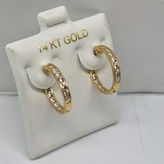 14k Pure Solid Yellow/White Gold Huggie Earrings With A Hinge/Notched Post Fastening And Dazzling Cubic Zirconia Stones (Not Gold Filled). -Number Of Stones-30 (15 Each) -Length: 16mm -Width: 3mm Gold Channel Set Huggie Jewelry, Luxury Gold Huggie Earrings Channel Set, Classic Gold Huggie Earrings Channel Set, Classic Gold Channel Set Huggie Earrings, Gold Diamond Earrings Channel Set, 14k Stamped Huggie Earrings For Anniversary, Luxury Gold Earrings Channel Set, 14k Huggie Earrings For Anniversary, Yellow 14k Gold Fine Earrings