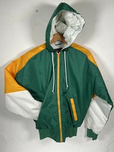 You Are Bidding On Vintage Rennoc Full Zip Quilted Lined Hooded Nylon Jacket Size Small Green Gold & White Check out my store for more great deals=) I can combine shipping when it makes sense, just ask! Shipping: All clothes will be shipped via USPS in a poly bag mailer to save on costs. All shipping is calculated automatically based on location, size, and weight. Casual Hooded Windbreaker For School, Hooded Fall Windbreaker For School, Retro Hooded Windbreaker For Fall, Casual Green Windbreaker With Adjustable Hood, Casual Green Hooded Windbreaker, Green Nylon Windbreaker For Fall, Green Nylon Hooded Jacket For Fall, Green Casual Nylon Hooded Jacket, Green Nylon Hooded Jacket Casual