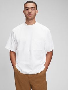 Soft knit.  Crewneck.  Short sleeves.  Patch pocket at chest. Gap Everyday Crew Neck T-shirt, Gap Casual Relaxed Fit T-shirt, Gap Summer T-shirt For Everyday Wear, Gap Short Sleeve T-shirt For Streetwear, Gap Casual T-shirt For Streetwear, Oversized Cotton Tops By Gap, White Relaxed Fit T-shirt By Gap, White Everyday Gap Tops, Everyday White Gap Tops