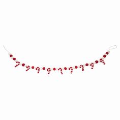 a red and white garland with candy canes on it