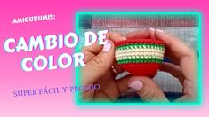 someone is holding a small crocheted cupcake in their hands with the words cambio de color on it