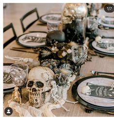 an image of a table setting with skulls on it