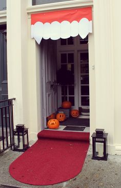 an entrance to a home decorated for halloween