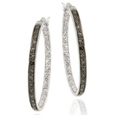 These chic hoop earrings feature a black and white themed design. The front of the hoops are black rhodium plated simulating shimmering black stones. There is one black diamond set among the pave pattern. The back of the hoop features a silver pave dot Product Details Metal Type sterling-silver Metal Stamp 925-sterling Weight 6GR Width 1.7MM Height 30MM Back Finding post-with-snap-down Stone Details Gem Type black-diamond Number of Stones 2 Stone Color black Stone Shape round-shape Total Weight Antique Jewelry Victorian, Victorian Style Rings, Victorian Style Jewelry, Diamond Pendant Jewelry, Silver Diamond Jewelry, Black Stones, White Stones, Diamond Dangle Earrings, Uncut Diamond