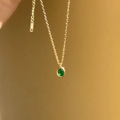 Emerald Gemstone Necklace, Green Pendant Necklace * Dainty Emerald Birthstone Jewelry * Emerald Green Necklace, May Birthstone Pendant, Gold Filled Emerald Necklace, Emerald Jewelry, Minimalist Necklace, Christmas Gift Birthday Gift for Her  -Green Zircon  - 14K Gold Plated -Necklace Length:40+5 cm -Pendant Size:6*9mm - Waterproof & Hypoallergenic - All items are nicely packaged in an elegant Gift jewelry box. *Great gift for: Wedding, Anniversary, Birthday, Christening, Christmas, Engagement, Graduation, Mother 's Day, Valentine's Day. *PLEASE NOTE >>The product is made to order, will take about 1-5 days to complete. >>Please feel free to contact me if you have any question. *Estimated Shipping Ready to ship in 1-5 business days. USA:  5-7 business days Other countries：7-10 business days Round Emerald Necklace As Gift, Gold Emerald Necklace With Delicate Chain For Gift, Dainty Gold Plated Emerald Necklace As A Gift, Gold Round Emerald Necklace Gift, Gold Oval Necklace For May Birthstone, Gold Oval Birthstone Necklace For Anniversary, Dainty Oval Necklace For May Birthstone, Dainty Oval May Birthstone Necklace, Gold Emerald Gemstone Necklace Gift