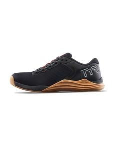 the men's black and red athletic shoe is on a white surface with an orange sole