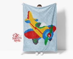 a blue towel with an airplane on it