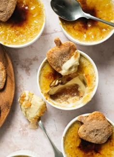 several bowls filled with dessert items on top of a table