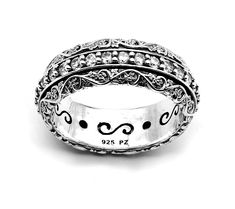 Add a touch of elegance to your jewelry collection with the Diamonique sterling silver spinner band ring. This exquisite piece features a floral design adorned with sparkling Diamonique simulated diamonds, perfect for any occasion. Ring Size Guide, 2 Carat, Band Ring, Prong Setting, Band Rings, Cubic Zirconia, Jewelry Collection, Jewelry Rings, Floral Design