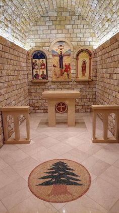 the inside of a small church with stone walls