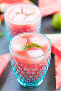 two glasses filled with watermelon and ice