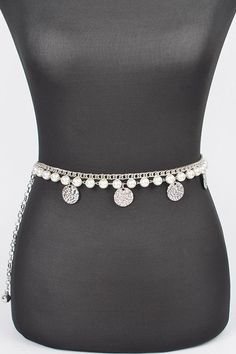 Add a touch of elegance to any outfit with our Fringe Disk Iconic Pearl Station Chain Belt. The delicate fringe disk design and iconic pearl stations bring a sense of sophistication and class to your look. This belt is the perfect accessory for any occasion, providing both style and functionality. One SizeWidth - 0.5"Length - 47"Rhinestone, IronLead & Nickel Compliant Adjustable Silver Elegant Waist Chain, Adjustable Silver Beaded Waist Chain, Elegant Silver Waist Chain With Pearls, Elegant Silver Pearl Chain Waist Chain, Chic Silver Metal Waist Chain, Silver Waist Chain With Pearl Detail, Silver Beaded Waist Chain, Silver Adjustable Chain Belt Fashion Accessory, Silver Adjustable Chain Belt