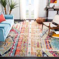 a living room with colorful rugs and furniture