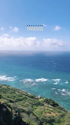 an aerial view of the ocean and land