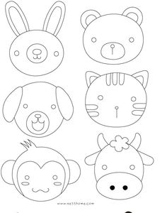 four different animal faces are shown in black and white, one is drawn on paper