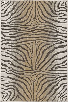 an animal print rug with zebra stripes on it