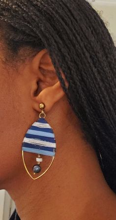 Women's artisan made silk hand wrapped earrings. Handcrafted with blue and silver color silk string and blue beads. Color: blue, silver Size: 1.25"x2.5', Drop 2.75" Type: Wire hook Brand: Lamani Colors: Blue, silver Style: Womens's Type: Post earrings Fabric: Silk string LAMANI Brand Story LAMANI is a mother and Son team located in San Francisco Bay Area who directly source from Lamani women artisans. Their in-house design team works closely with artisans to develop beautiful collections. Materi Earrings Fabric, String Earrings, Wrapped Earrings, Stockings Legs, Belt Jewelry, Jewelry Choker, Silver Style, Hand Wrap, Brand Story