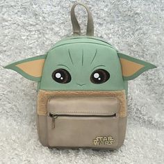 Nwt Star Wars Baby Yoda The Child Grogu Figural Mini Backpack. Outside Zip Pocket, Zip Main Closure With Inside Zip Pocket, Adjustable Straps. Measurements Approx 9"X4"X10.5" Price Is Firm. Please Do Not Send Offers Unless Bundled With Other Items With A Reasonable Offer. Combine Orders Into A Bundle And Pay For Only One Shipping. C-28 C-42 C-14 Star Wars Bag, Star Wars Backpack, Princess Backpack, Mickey Mouse Backpack, Disney Animators Collection, Disney Vacation Club, Backpack Lunch Bag, Star Wars Women, Plush Backpack