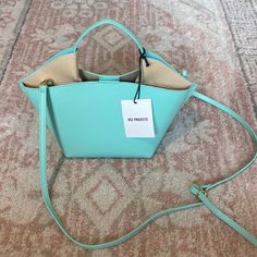 Nwt, No Flaws. Gorgeous Mint/ Tiffany Blue And Nude Contrast. No Dust Bag But Have Authenticity Card. 7”W X 6 1/2”H X 4 1/2”D. (Interior Capacity: Small.) 3 1/2 Handle; 11" - 25" Crossbody Strap Drop .7 Lbs Luxury Blue Box Bag For Errands, Designer Blue Tote Box Bag, Modern Blue Box Bag With Dust Bag, Designer Blue Box Bag With Detachable Handle, Designer Blue Box Bag For Everyday Use, Designer Spring Bucket Shoulder Bag, Designer Blue Box Bag For Shopping, Designer Blue Rectangular Bucket Bag, Spring Designer Bucket Shoulder Bag