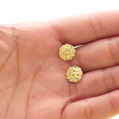 These round gold nugget stud earrings are perfect for a man or woman. They are shaped as a round gold nugget with dimensions of 0.4" x 0.4". Handcrafted and stamped in 10 karat gold. Gold Nugget Earrings, Nugget Earrings, Gold Initial Ring, Polo Outfit, Clean Gold Jewelry, Expensive Jewelry Luxury, Gold Nugget, Expensive Jewelry, Gold Initial