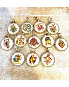 a group of twelve different types of key chains