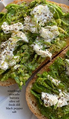 two pieces of bread topped with green vegetables