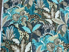 a blue and brown floral print fabric