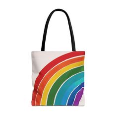 Introducing our Boho Watercolor Rainbow Arch Tote Bag!  This tote bag accessory features a colorful Arched Watercolor Retro and Boho themed Rainbow. This design is sure to captivate admirers wherever you go as you carry your books, notebooks, and personal items in this durable polyester tote bag. Ideal for carrying groceries, books, school essentials, and more while showcasing your love for Rainbows, vibrant Watercolors, Cottagecore, Light Academia, and Retro styles. Made with spun polyester, th Multicolor Softback Travel Bag, Retro Multicolor Shoulder Bag For Daily Use, Trendy Rainbow Travel Bag, Rectangular Multicolor Beach Bag For Everyday Use, Trendy Rainbow Bags For Everyday Use, Colorful Large Capacity Tote Bag, Retro Multicolor Tote Canvas Bag, Colorful Retro Shoulder Bag, Multicolor Pouch Bag For School