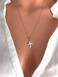 Silver Cross Pendant Charm Necklaces, Elegant Crucifix Metal Necklace, Crucifix Metal Jewelry, Elegant Metal Crucifix Necklace, Crucifix Charm Necklaces For Gifts, Metal Crucifix Necklace As Gift, Gift Crucifix Charm Necklace, Elegant Silver Cross Charm Necklaces, Silver Cross Clavicle Chain Necklace