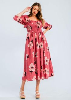 Easy floral midi dress featured in a flowy silhouette with a smocked bodice and volume sleeves. Cotton voile, textured fabrication  Relaxed fit  Side pockets -Contents 70%Cotton 30%Rayon Approximate measurements are as follows Small: Length:48 3/4 " Bust: 29"- 49"  Waist: 28- 48" Medium: Length:49 1/4" Bust:31"-51"    Waist 30- 50"  Large: Length:49 3/4" Bust:33"-53" Waist 32 -52" Square Neck Floral Dress For Day Out, Feminine Floral Dress With Smocked Bodice, Feminine Smocked Dress With Ditsy Floral Print For Spring, Spring Flowy Smocked Dress With Ditsy Floral Print, Spring Flowy Ruched Maxi Dress, Spring Feminine Smocked Dress With Ditsy Floral Print, Flowy Ruched Maxi Dress For Spring, Spring Smocked Flowy Dress With Ditsy Floral Print, Pink Maxi Length Smocked Dress For Spring