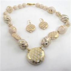 Ivory Handmade Kazuri Fair Trade Pendant Necklace Handmade Cream Jewelry For Jewelry Making, Elegant Beige Jewelry With Large Beads, Elegant Cream Jewelry With Large Beads, Cream Jewelry With Large Beads As A Gift, Cream Jewelry With Large Beads For Gift, Traditional Cream Jewelry For Gifts, Traditional Cream Jewelry Gift, Cream Costume Jewelry As Gift, Cream Costume Jewelry For Gifts