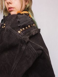 Upcycled black denim jacket with handmade rips. This classic, vintage black denim trucker jacket was decorated with round gold studs and rips. Additionally, there are two types and colors of fringes - black and gold. There is only one piece of such jacket and this makes it one of a kind and eye-catching. If you want to stand out, this jacket is perfect for you. Also, you will rock in it on special events like music festivals or concerts; even photoshoots! Durable 100% cotton denim assures you th Fringe Denim Jacket, Vintage Fringe, Black Jean Jacket, Festival Jacket, Retro Jeans, Denim Trucker Jacket, Black Denim Jacket, Music Festivals, Trucker Jacket