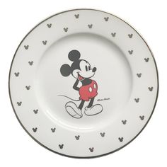 a mickey mouse plate with hearts on the front and back side, in black and white