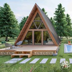 a - frame cabin in the middle of a grassy field with a pool and lounge chairs