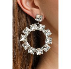 You deserve to be a princess for your day. ⬇️ Shipping takes; 2-4 days to USA 1-3 days to EU 2-5 days to rest of the world. PRODUCT DESCRIPTION👇 These Jewelry Furtek earrings are the epitome of fashion and style. Their combination of crystal stone and rhinestone creates a stunning look that is both trendy and elegant. The crystal stone sparkles in the light, adding a touch of sophistication to your outfit. The rhinestones are strategically placed to enhance the overall design, creating a piece White Diamond Pierced Earrings For Party, Glamorous Hoop Earrings For Anniversary, Crystal Hoop Earrings For Party, Crystal Hoop Earrings For Wedding, Wedding Crystal Hoop Earrings, Diamond White Pierced Party Earrings, Hoop Crystal Earrings For Pierced Ears, Crystal Hoop Earrings For Pierced Ears, Round Diamond Earrings For Party